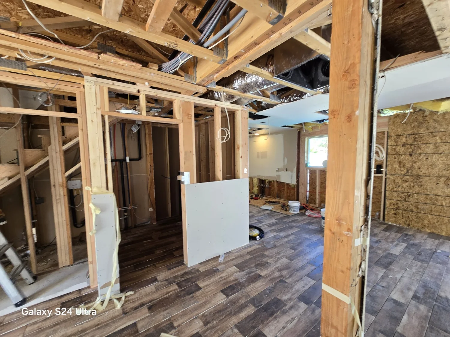 Remodeling with framing and wiring visible